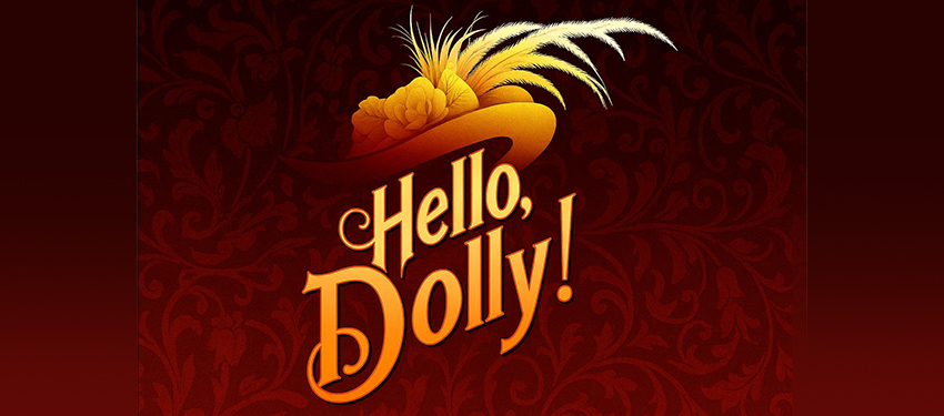 A feathered hat with the words Hello, Dolly! under it